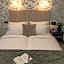 Happy Inn Rooms & Suites