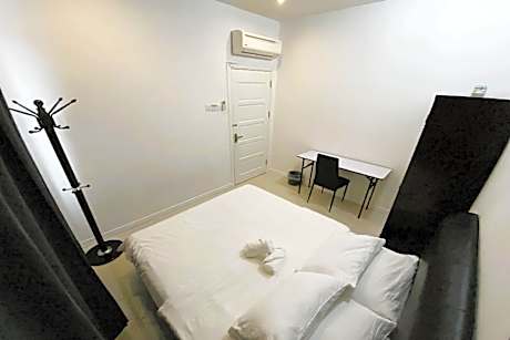 Queen Room with Shared Bathroom