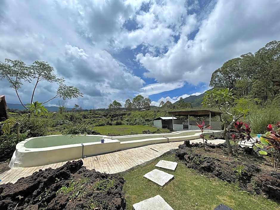 Triangular house and hot spring