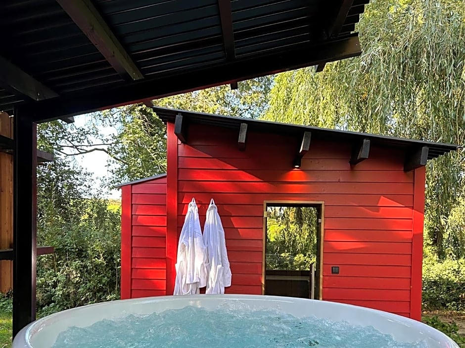 Cabanes avec jacuzzi les pieds dans la vignes