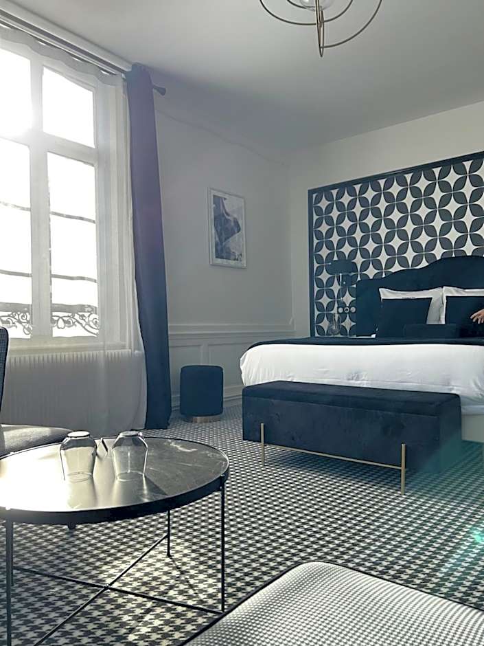 Hôtel Échappée en Baie - Parking privé gratuit dont forfaits bornes électriques réservable