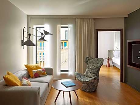 King Suite with Sofa Bed and Lounge Area - Pool View