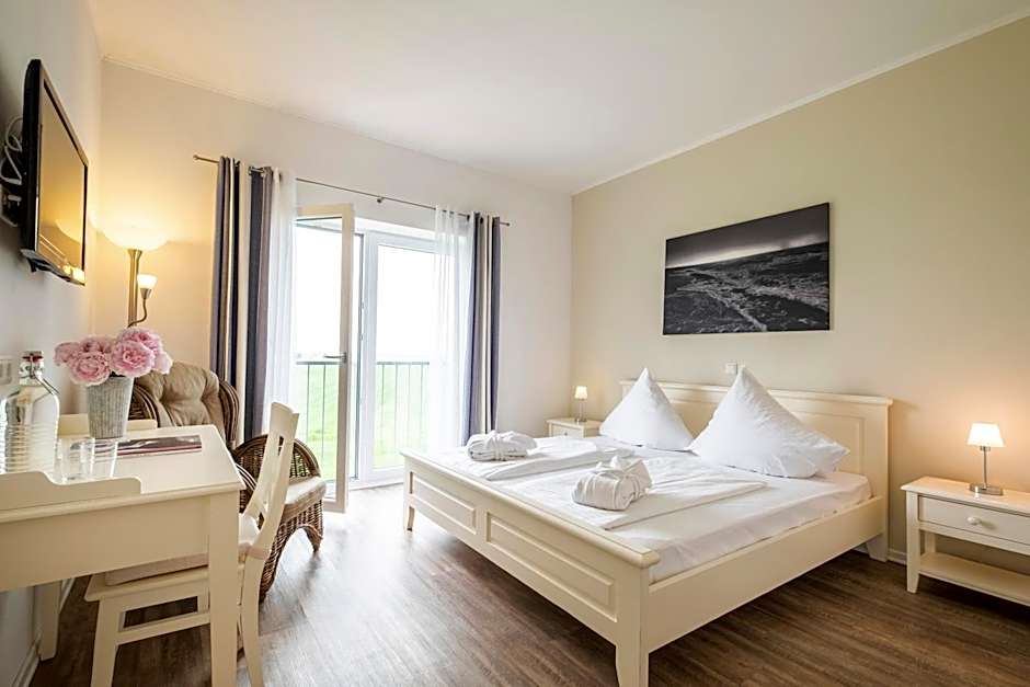Hotel Pharisäerhof - DAS Hundehotel auf Nordstrand mit Restaurant und Café