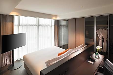 Premium Two Bedroom Suite with One King and Two Twin Beds