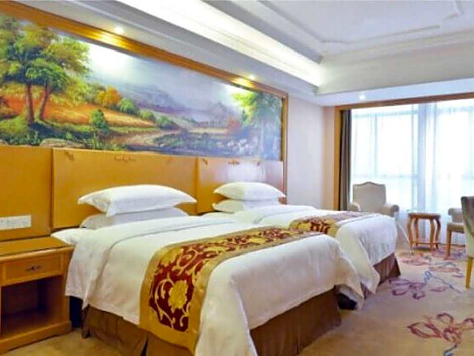 Vienna International Hotel Meizhou Spindle Bridge Branch