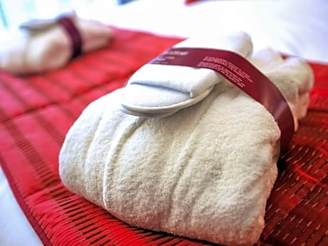 Privilege Room with a double bed and a sofa