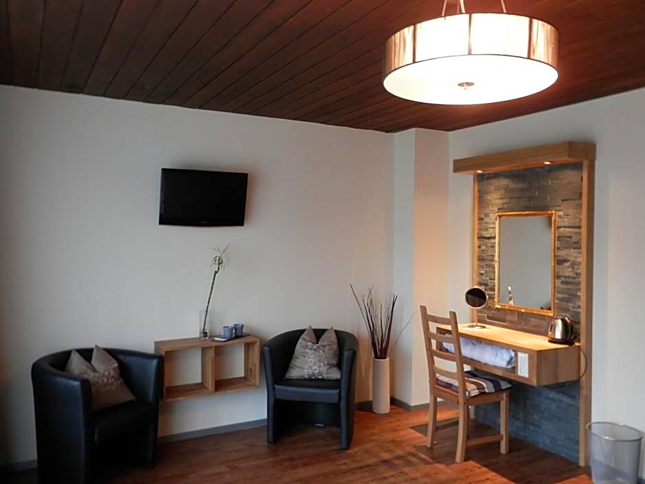 Dahoam by Sarina - Rooms & Suites