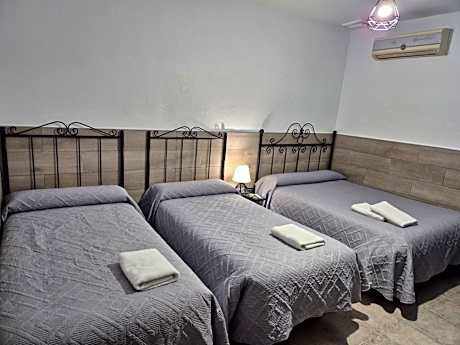 Quadruple Room with Shared Bathroom