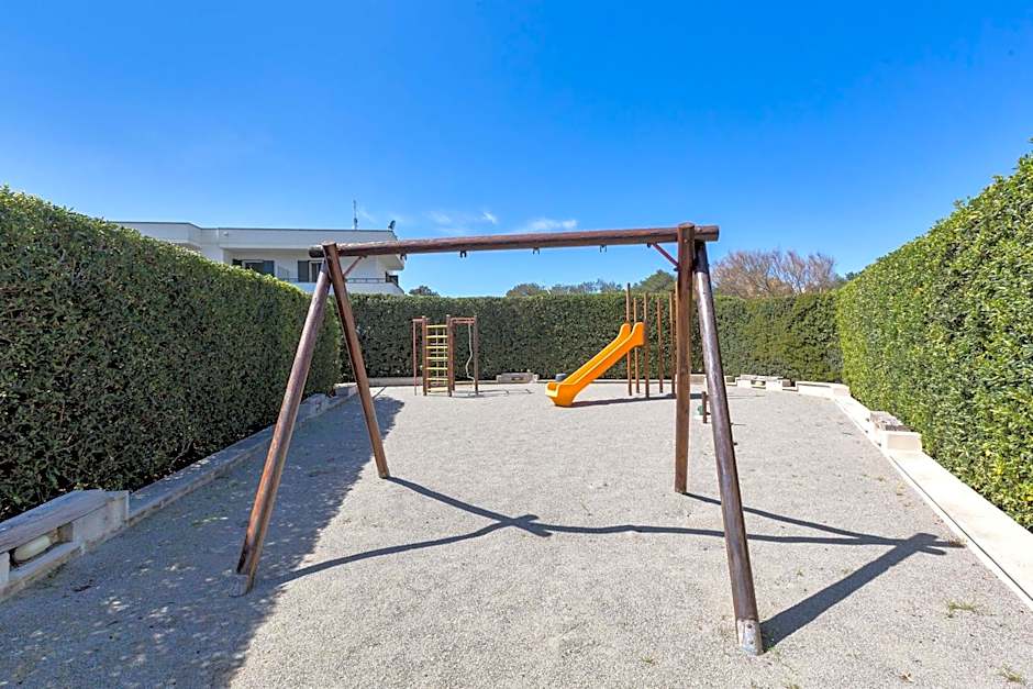 Residence Punta Cassano - In piscina sulla spiaggia di sabbia