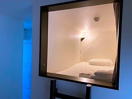 Single Bed in Dormitory Room