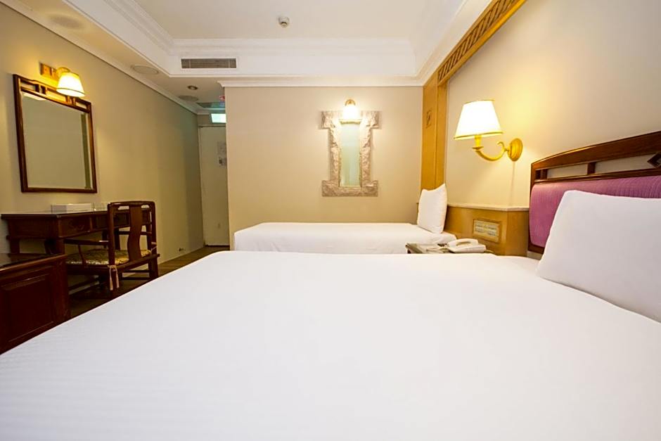 Photo 1 of 4 of Triple Room with Private Bathroom