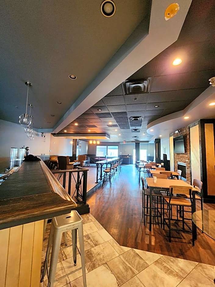 Merit Hotel & Suites