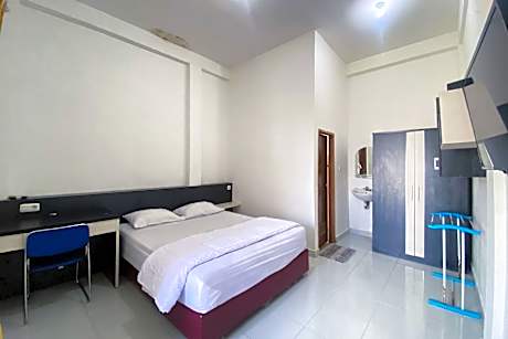 Wisma Al-Araf Syariah Mitra RedDoorz Palembang