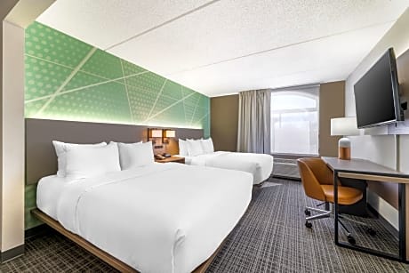 Efficiency Quadruple Room with Two Queen Beds - Non Smoking