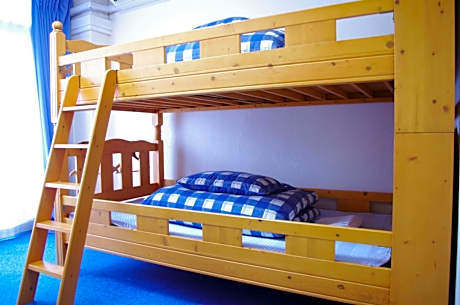 Bed in Female Dormitory Room without a curtain