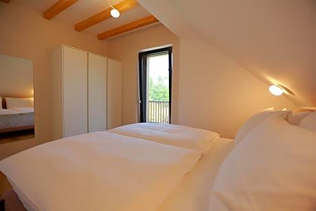 Two-Bedroom Duplex Apartment with Balcony