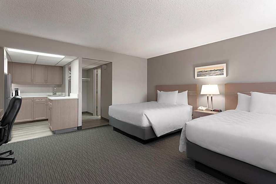 Photo 1 of 5 of Deluxe 2 Queen Beds and 1 Double Bed, Nonsmoking, Ground Floor