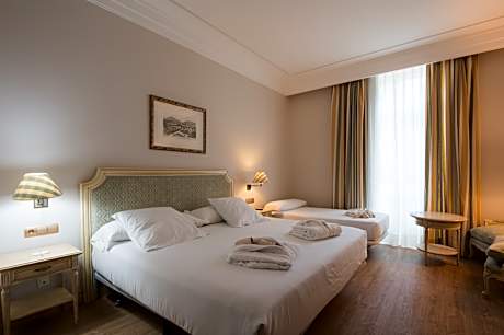 Doble 1 o 2 camas + cama extra child