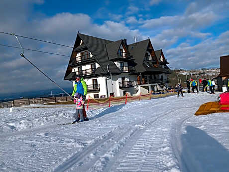 Aparthotel Rabiań-SKI 10metrów do wyciagu połączonego z całą Kotelnicą na miejscu wypoożyczalnia z serwisem