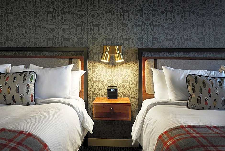 Photo 1 of 9 of 2 Queen Beds