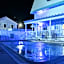 NEW 2026-Ocean Sands Beach Boutique Inn-24Hr Sauna and Salt-Mineral Pool-Free Beach Bikes and Famous Beach-Fresh Baked Cookies-Popcorn-In Room Bathrobes-Sunscreen-65 Inch TVsNetflix-Bedside Candy-Free Laundry- 4 Grand Black Beds-Call & Save-1-252-AHA-SAND