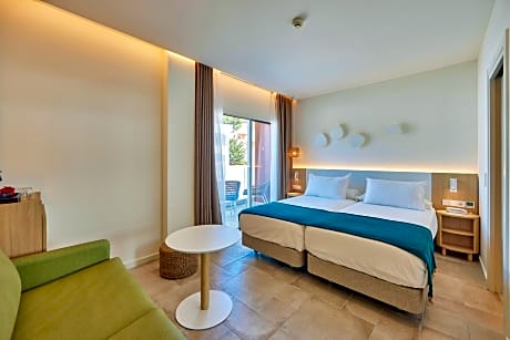 Twin Room (2 Adults + 1 Child )