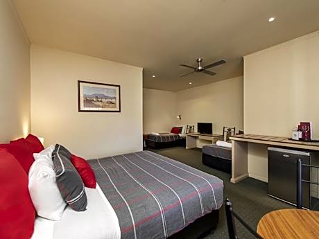 Standard Suite with One King Bed and Two Single Beds