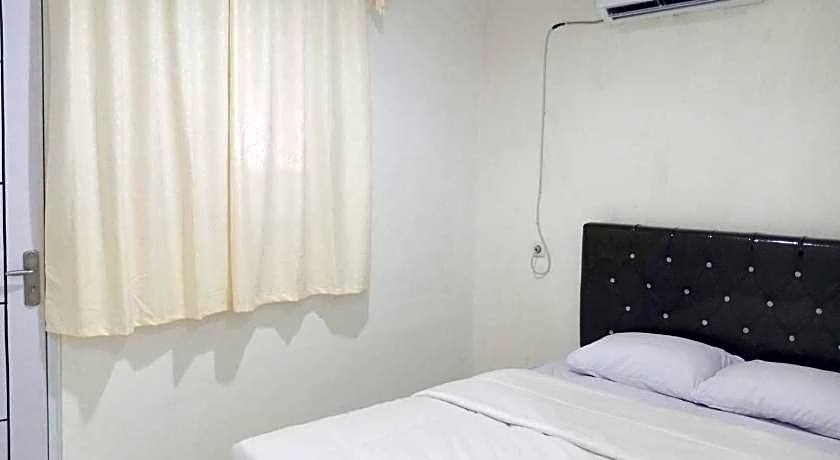 Capital O 93728 Guest House Cemara