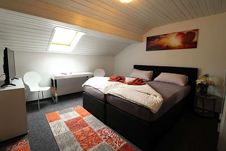 Foto 1 von 5 von Basic Triple Room with Shared Bathroom