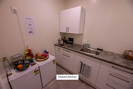 Standard Double Room with Shared Bathroom