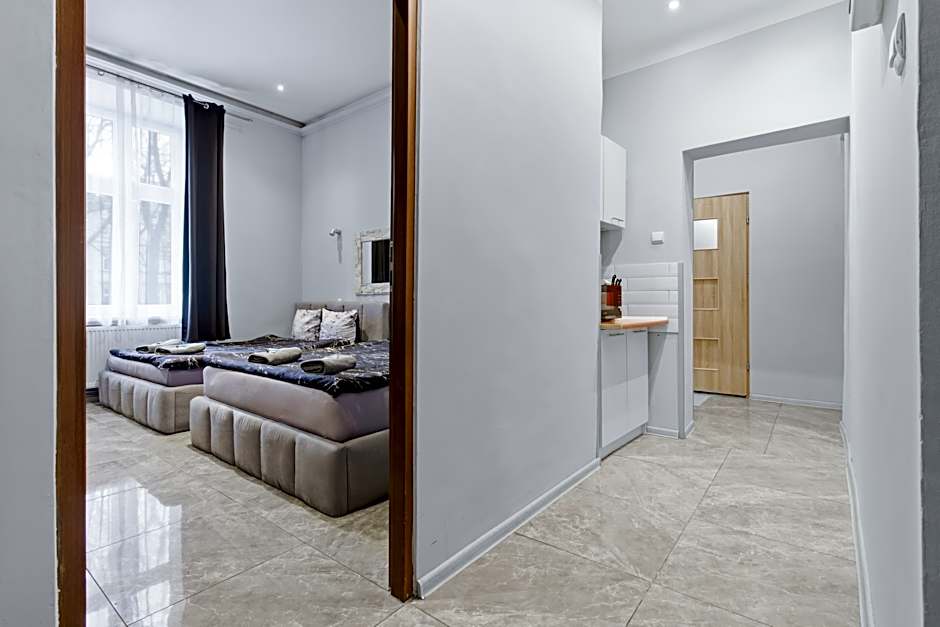 Queen Apartments