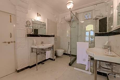 Suite with Lake View :  Avail 15% Discount on all restaurant bills,50% Discount on any spa services (Valid for stay till 30th September 2025)