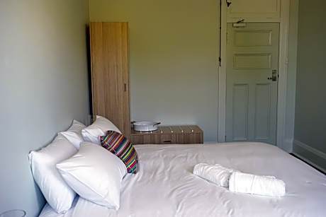 Deluxe King Room with Shared Bathroom