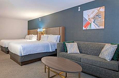 Room with Two Queen Beds and a Sofa Bed