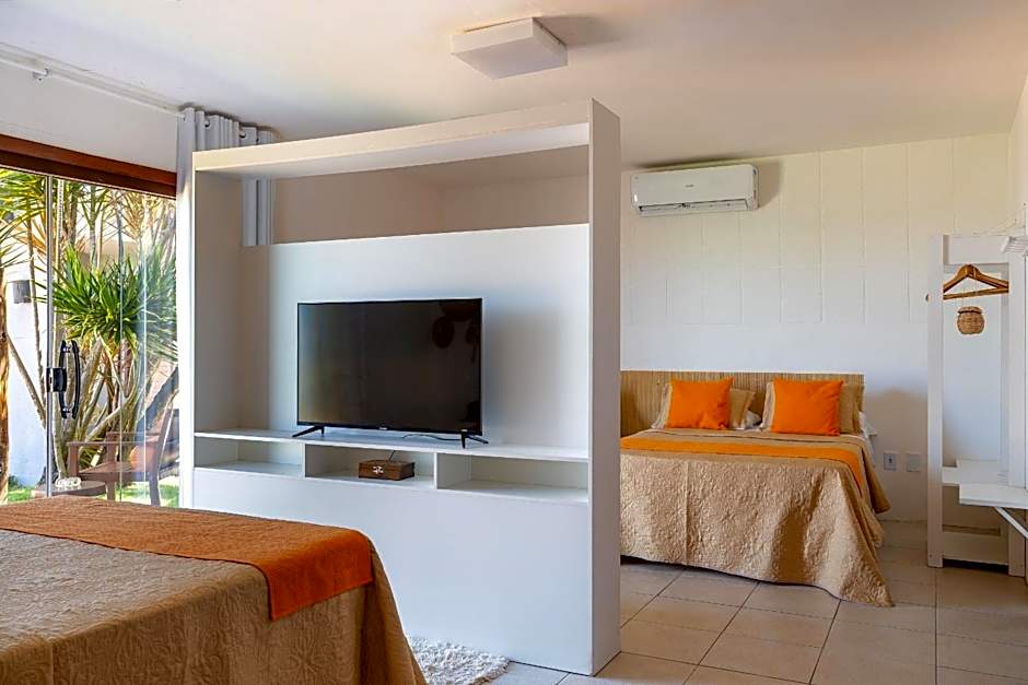 Casa Ilha| beira mar, piscina aquecida, 4 suítes