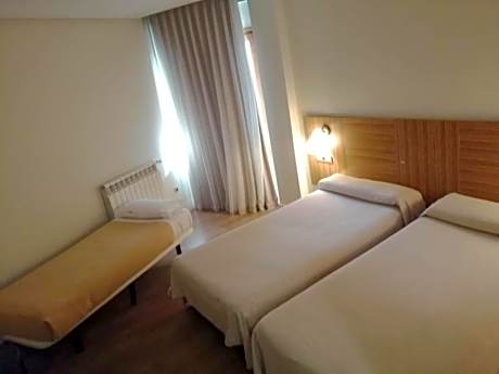 Economy Triple Room (2 Adults + 1 Child)