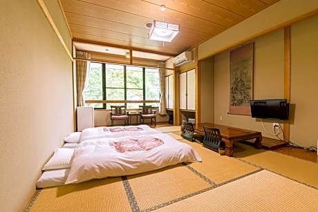 Japanese-Style Family Room with Shared Bathroom
