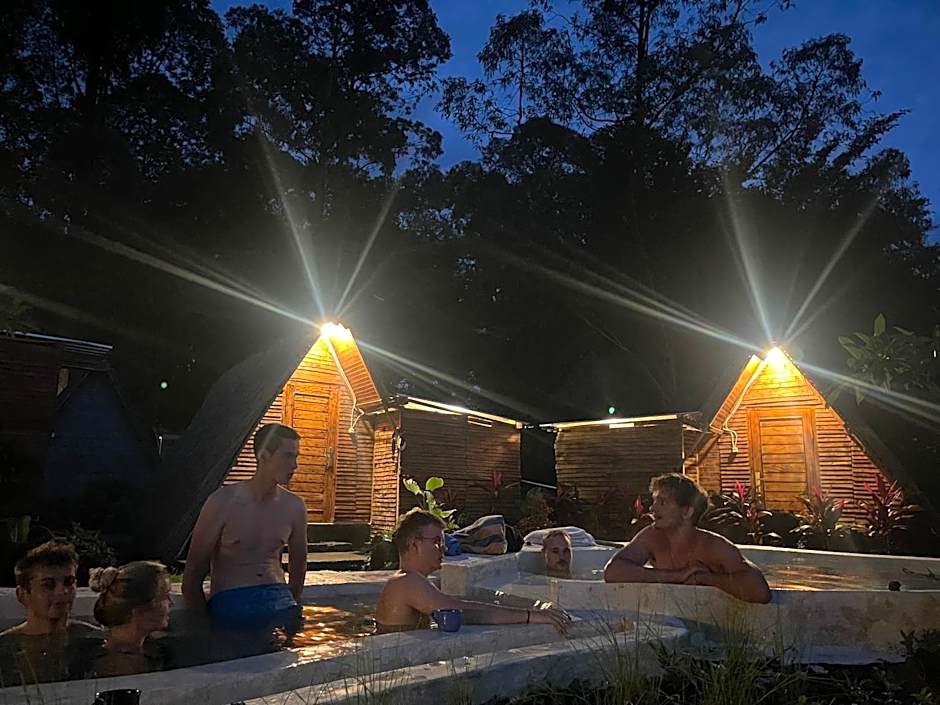 Triangular house and hot spring