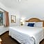 Beach House Inn & Suites