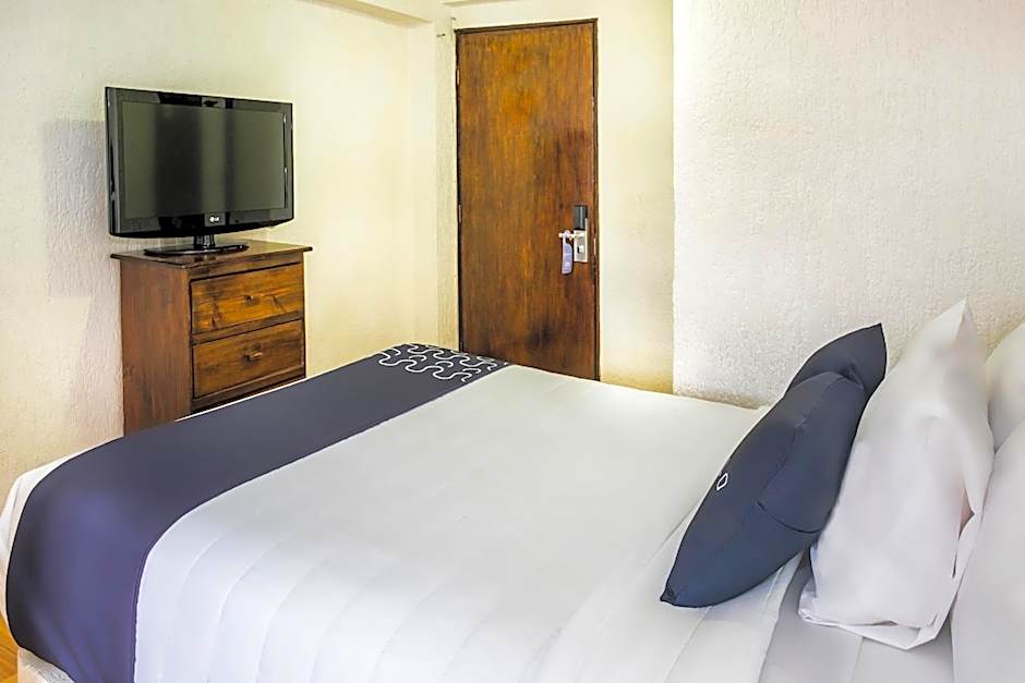 Capital O Hotel Central