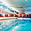 Österreichischer Hof-im Bademantel direkt in die Alpentherme