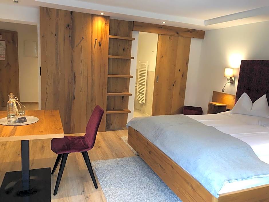 Hotel Garni Central - Zimmer - Studios - Apartments