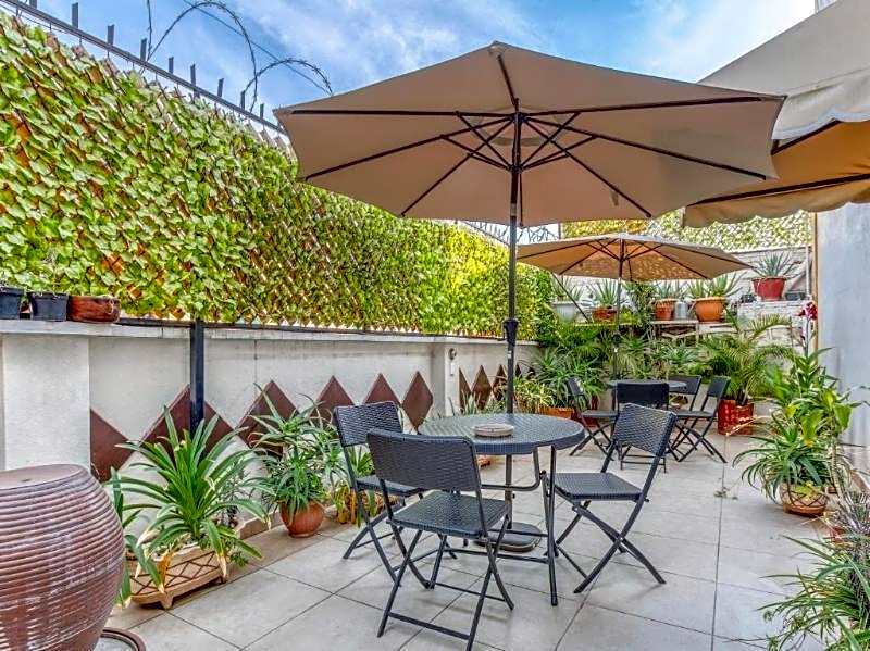 Capital O Hotel Patio Pombo