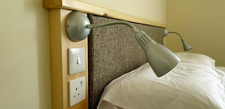 Photo 1 of 18 of Standard Single Room with Shared Bathroom