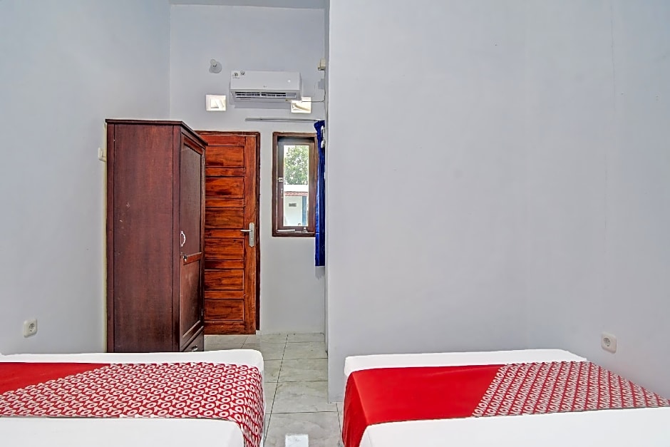 SPOT ON 91995 Cvictory Inn