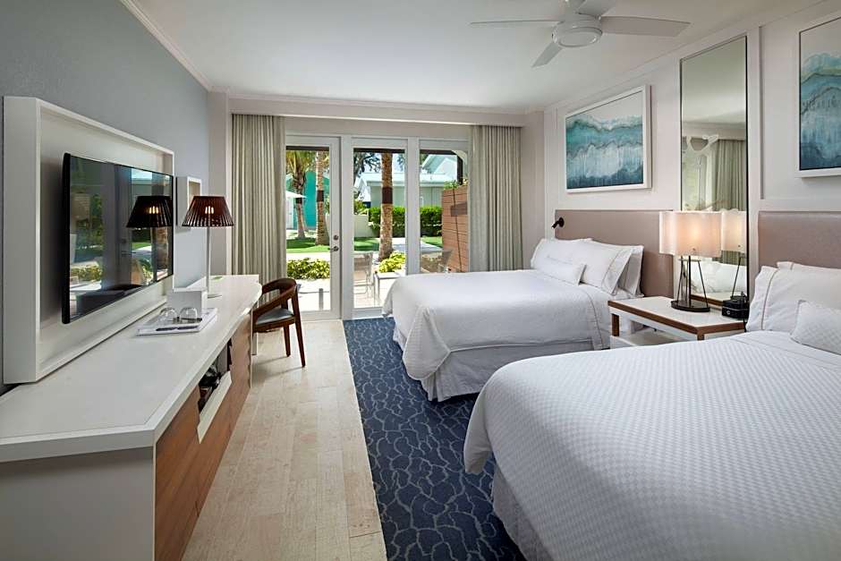 Photo 1 of 2 of 2 Double Beds Guestroom, Ocean and Pool View, Lanai