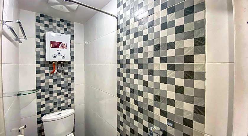 Tini's Guest House Malang Mitra RedDoorz