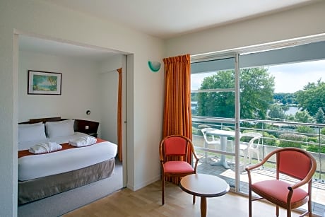 Suite-1 Queen Bed, Non-Smoking, Balcony, Sofabed, Living Room