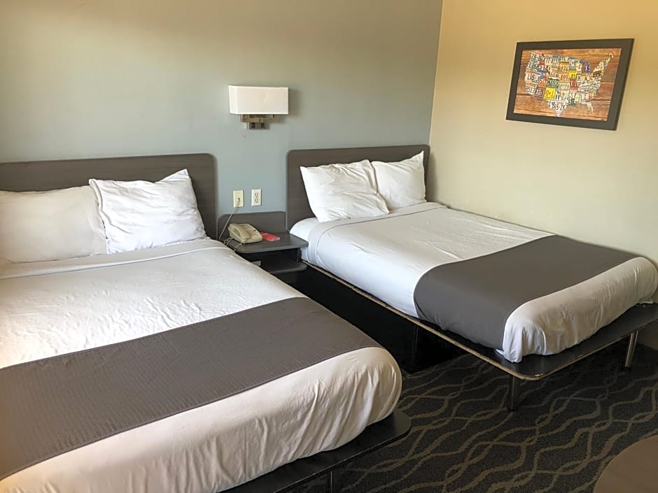 Photo 1 of 4 of Queen Suite with Two Queen Beds and Pool View - Non-Smoking