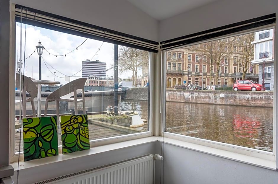 HouseBoat next to AMSTEL